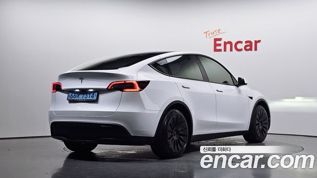 Tesla Model Y RWD — пробег 111 405 км — фото 2 из 5