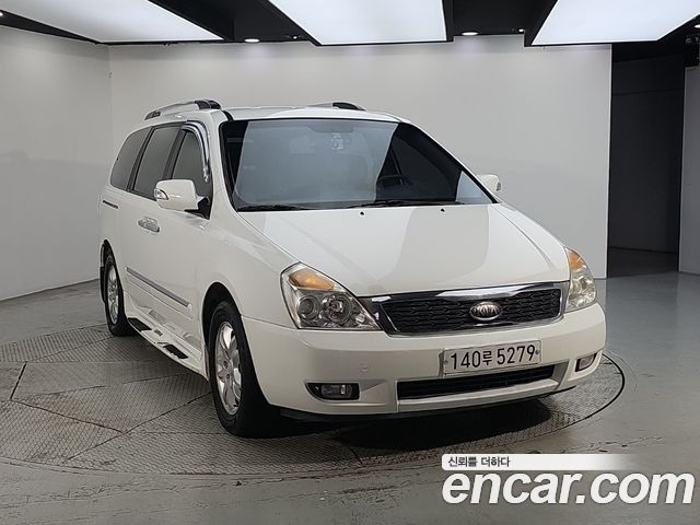 Kia Carnival Grand Carnival GX Grand Pack — пробег 277 633 км — фото 2 из 5