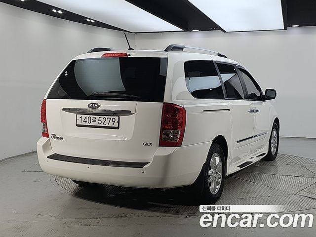 Kia Carnival Grand Carnival GX Grand Pack — пробег 277 633 км — фото 4 из 5