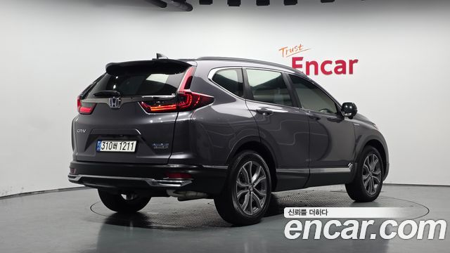 Honda CR-V 2.0 Hybrid Touring 4WD — пробег 28 355 км — фото 2 из 5