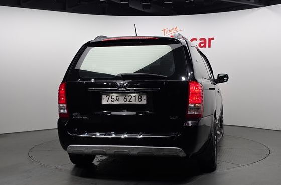Kia Carnival Grand Carnival GLX Premium — пробег 202 790 км — фото 4 из 5