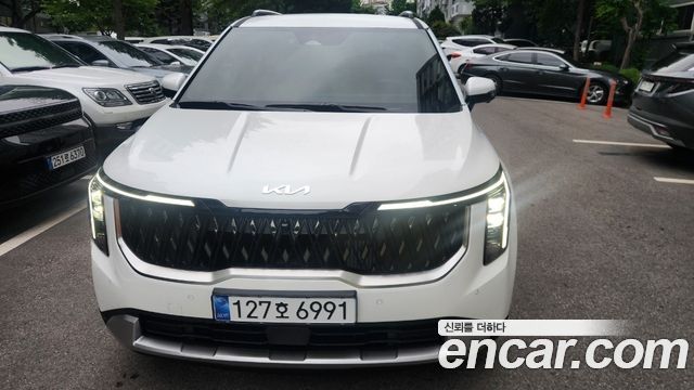 Kia Carnival HEV 9 seater Prestige — пробег 1 100 км — фото 1 из 5
