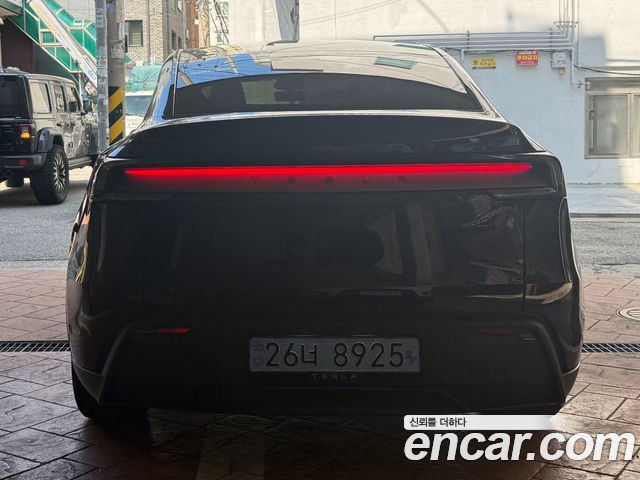 Tesla Model Y Premium RWD — пробег 1 002 км — фото 4 из 5