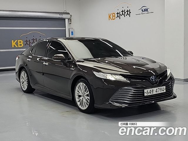 Toyota Camry 2.5 XLE Hybrid — пробег 142 689 км — фото 4 из 5