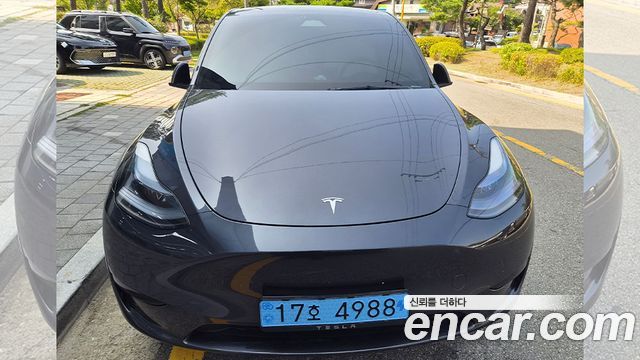 Tesla Model Y RWD — пробег 33 744 км — фото 5 из 5