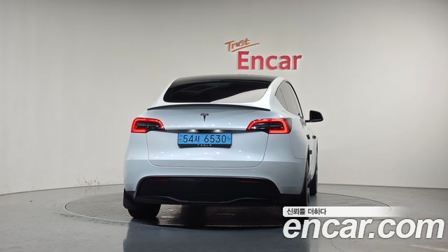 Tesla Model Y RWD — пробег 35 569 км — фото 4 из 5