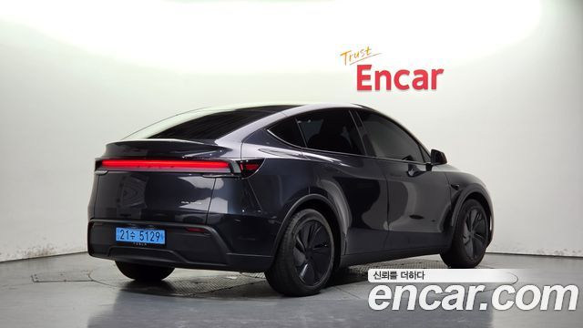 Tesla Model Y Premium Long Range AWD — пробег 9 789 км — фото 2 из 5