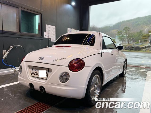 Daihatsu Copen 0.6 — пробег 154 000 км — фото 5 из 5