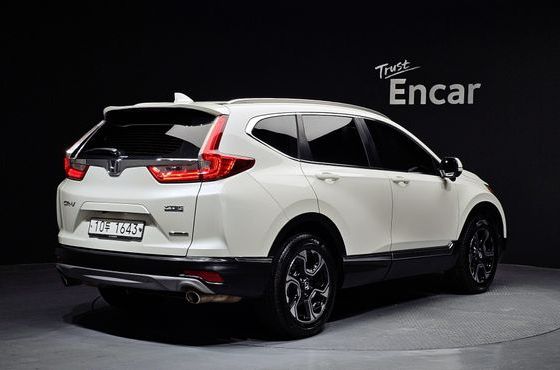 Honda CR-V 1.5 Touring 4WD — пробег 63 727 км — фото 2 из 5