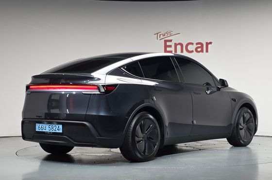 Tesla Model Y RWD — пробег 12 364 км — фото 2 из 5
