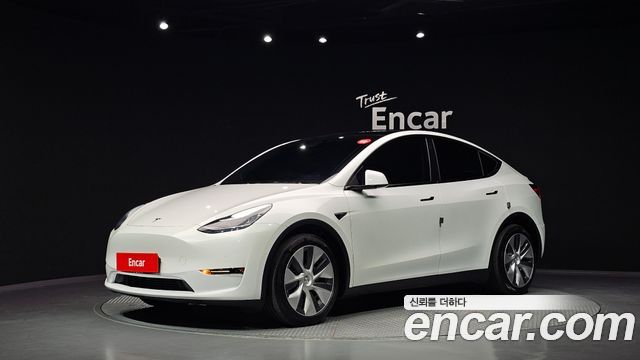 Tesla Model Y Long Range AWD — пробег 57 931 км — фото 1 из 5