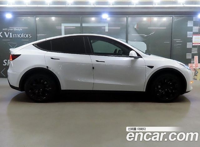 Tesla Model Y Long Range AWD — пробег 99 004 км — фото 2 из 5