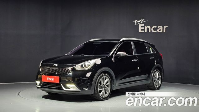 Kia Niro Prestige — пробег 136 360 км — фото 1 из 5