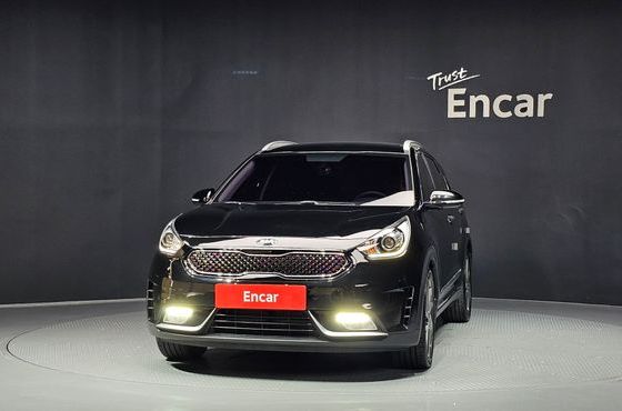 Kia Niro Prestige — пробег 136 360 км — фото 3 из 5