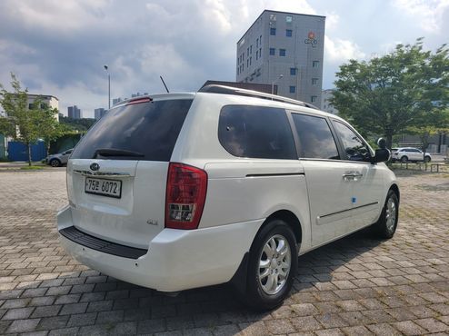 Kia Carnival Grand Carnival GLX Premium — пробег 124 267 км — фото 4 из 5