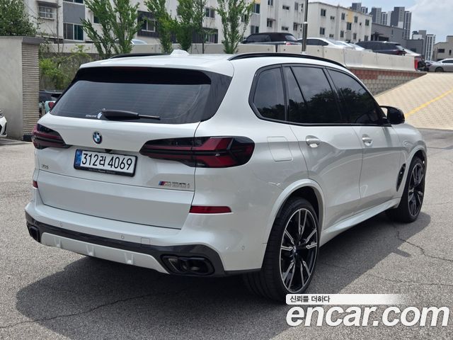 BMW X5 M60i — пробег 4 560 км — фото 2 из 5