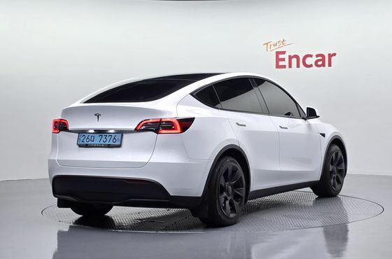 Tesla Model Y RWD — пробег 32 330 км — фото 2 из 5