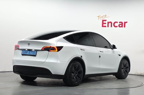 Tesla Model Y RWD — пробег 22 927 км — фото 2 из 5