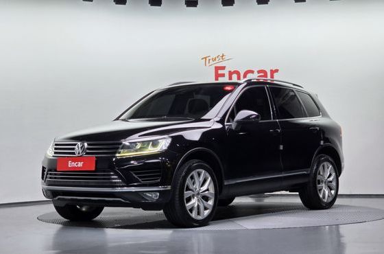 Volkswagen Touareg V6 3.0 TDI Bluemotion Premium 7P5 — пробег 142 933 км — фото 1 из 5