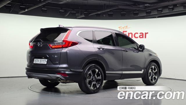 Honda CR-V 1.5 Touring 4WD — пробег 179 852 км — фото 2 из 5