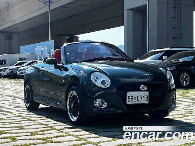 Daihatsu Copen 0.6 — пробег 146 465 км — фото 1 из 5