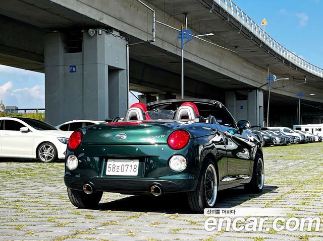 Daihatsu Copen 0.6 — пробег 146 465 км — фото 4 из 5