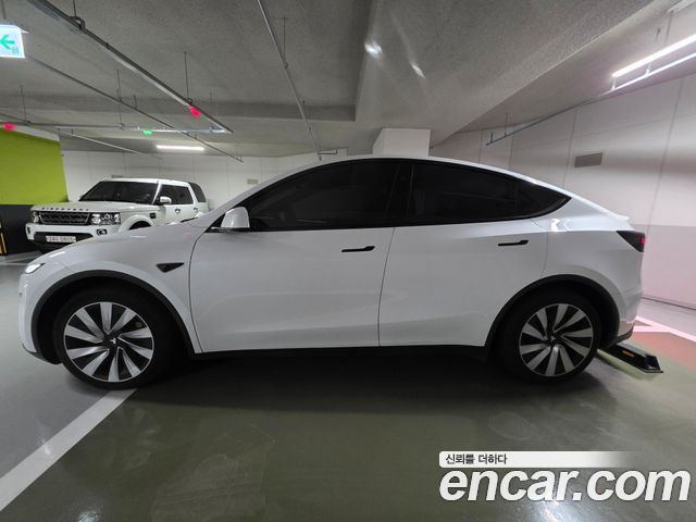 Tesla Model Y Long Range AWD — пробег 31 000 км — фото 4 из 5