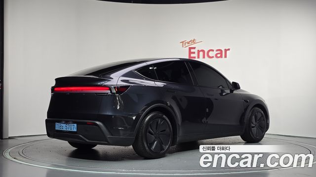 Tesla Model Y Premium RWD — пробег 21 072 км — фото 2 из 5