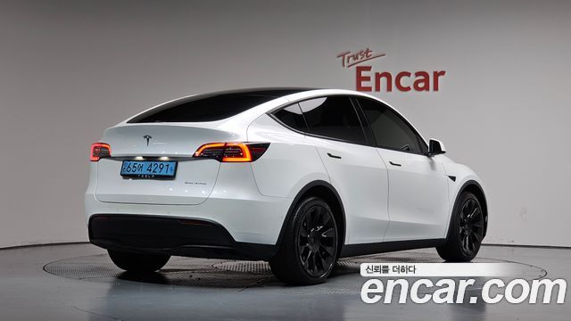Tesla Model Y Long Range AWD — пробег 61 185 км — фото 2 из 5