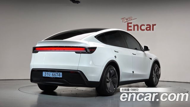 Tesla Model Y RWD — пробег 16 757 км — фото 2 из 5