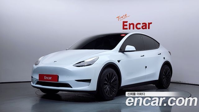 Tesla Model Y RWD — пробег 34 096 км — фото 1 из 5