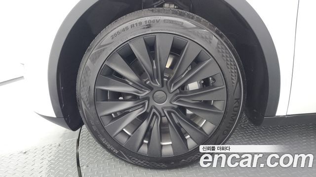 Tesla Model Y RWD — пробег 34 096 км — фото 5 из 5