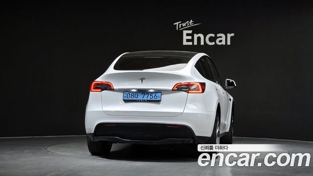 Tesla Model Y RWD — пробег 29 555 км — фото 4 из 5