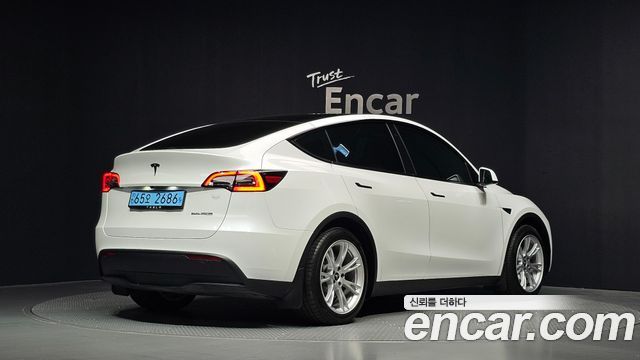 Tesla Model Y RWD — пробег 37 872 км — фото 2 из 5