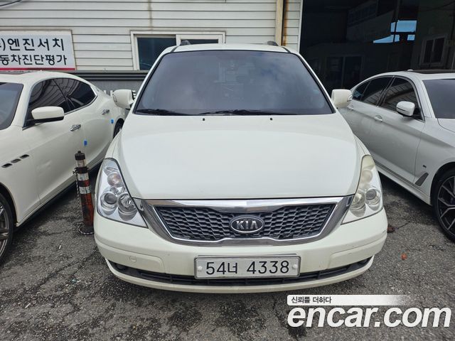 Kia Carnival New Carnival GX Standard — пробег 242 500 км — фото 1 из 5