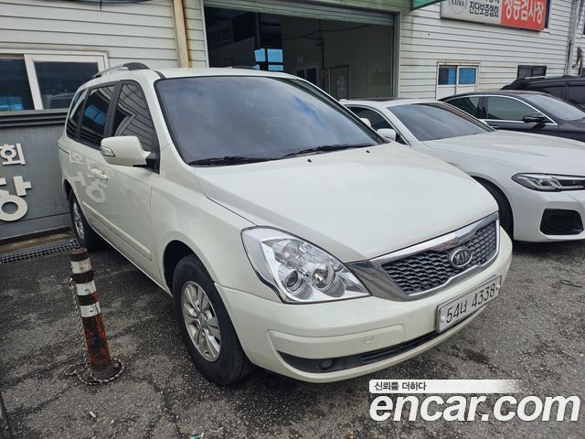 Kia Carnival New Carnival GX Standard — пробег 242 500 км — фото 2 из 5