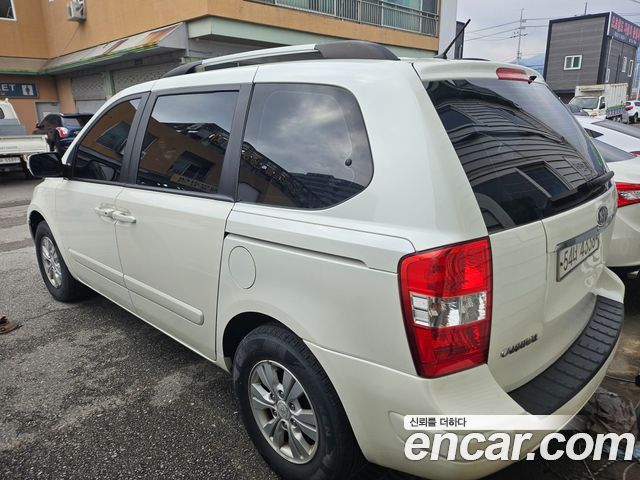 Kia Carnival New Carnival GX Standard — пробег 242 500 км — фото 4 из 5