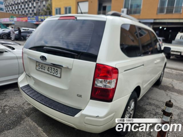 Kia Carnival New Carnival GX Standard — пробег 242 500 км — фото 5 из 5