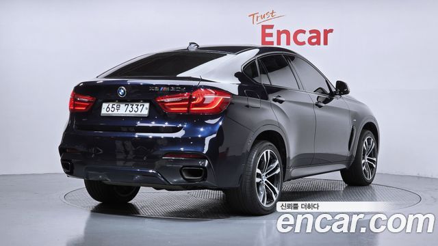 BMW X6 M50d — пробег 144 498 км — фото 2 из 5