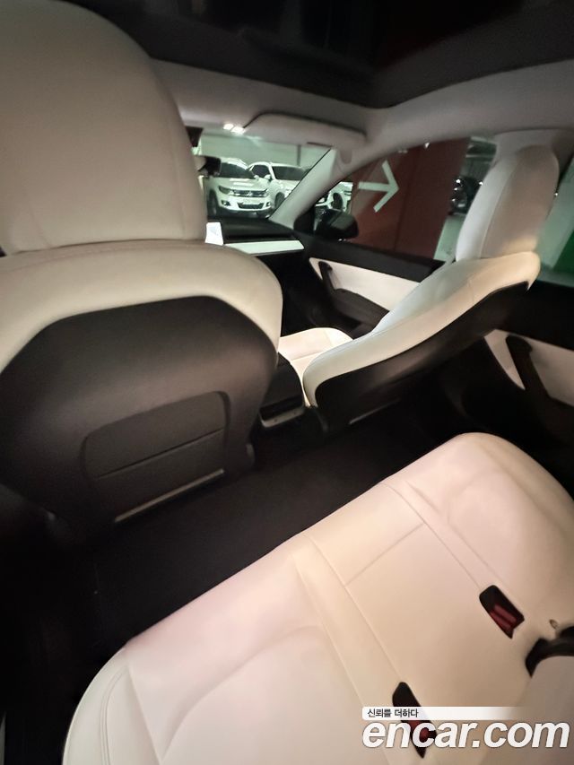 Tesla Model Y Standard Range RWD — пробег 88 900 км — фото 2 из 5
