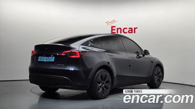 Tesla Model Y Long Range AWD — пробег 32 418 км — фото 2 из 5