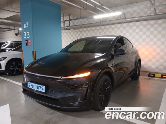 Tesla Model Y Premium RWD — пробег 1 824 км — фото 2 из 5