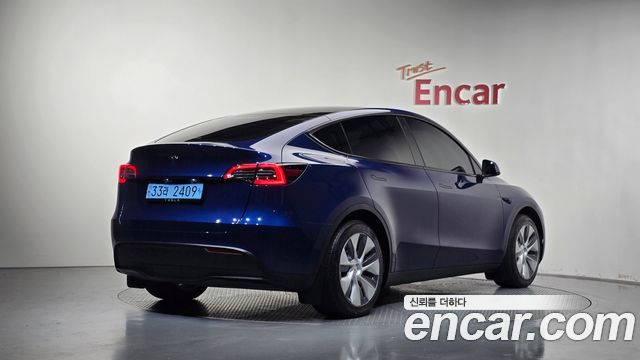 Tesla Model Y RWD — пробег 23 180 км — фото 2 из 5