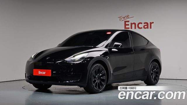 Tesla Model Y RWD — пробег 26 900 км — фото 1 из 5
