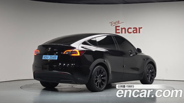 Tesla Model Y RWD — пробег 35 271 км — фото 2 из 5