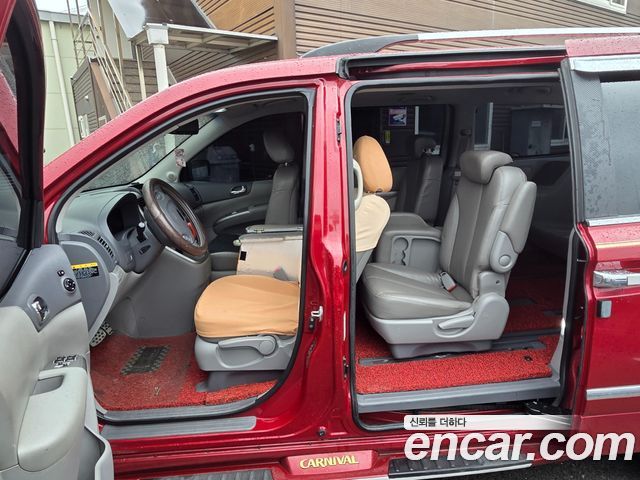 Kia Carnival Grand Carnival GLX Premium — пробег 296 500 км — фото 5 из 5