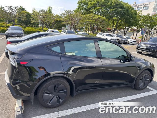 Tesla Model Y RWD — пробег 11 200 км — фото 2 из 5