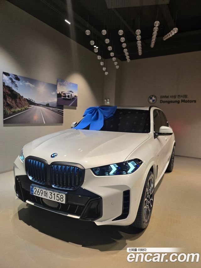 BMW X5 xDrive 50e M Sport — пробег 9 990 км — фото 1 из 5