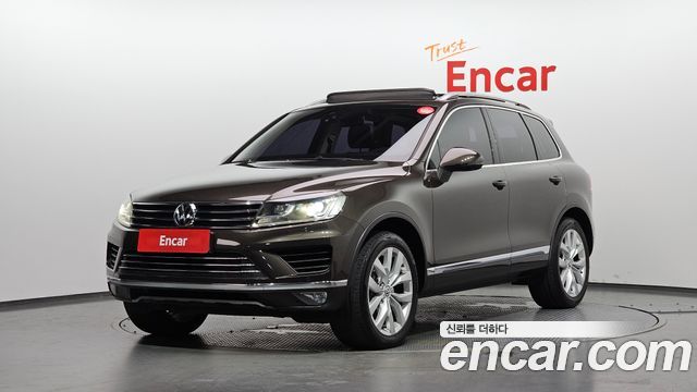 Volkswagen Touareg V6 3.0 TDI Bluemotion Premium 7P5 — пробег 256 586 км — фото 1 из 5