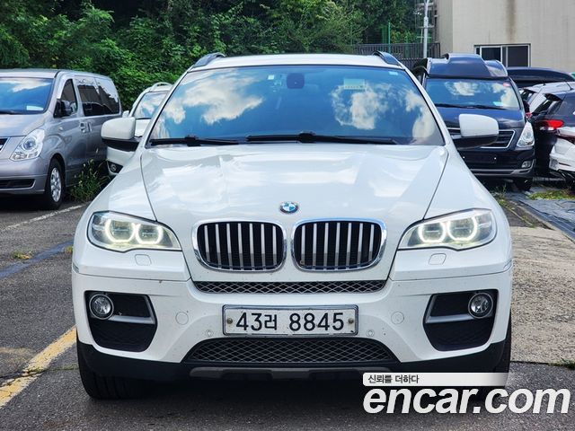 BMW X6 40d — пробег 209 241 км — фото 2 из 5